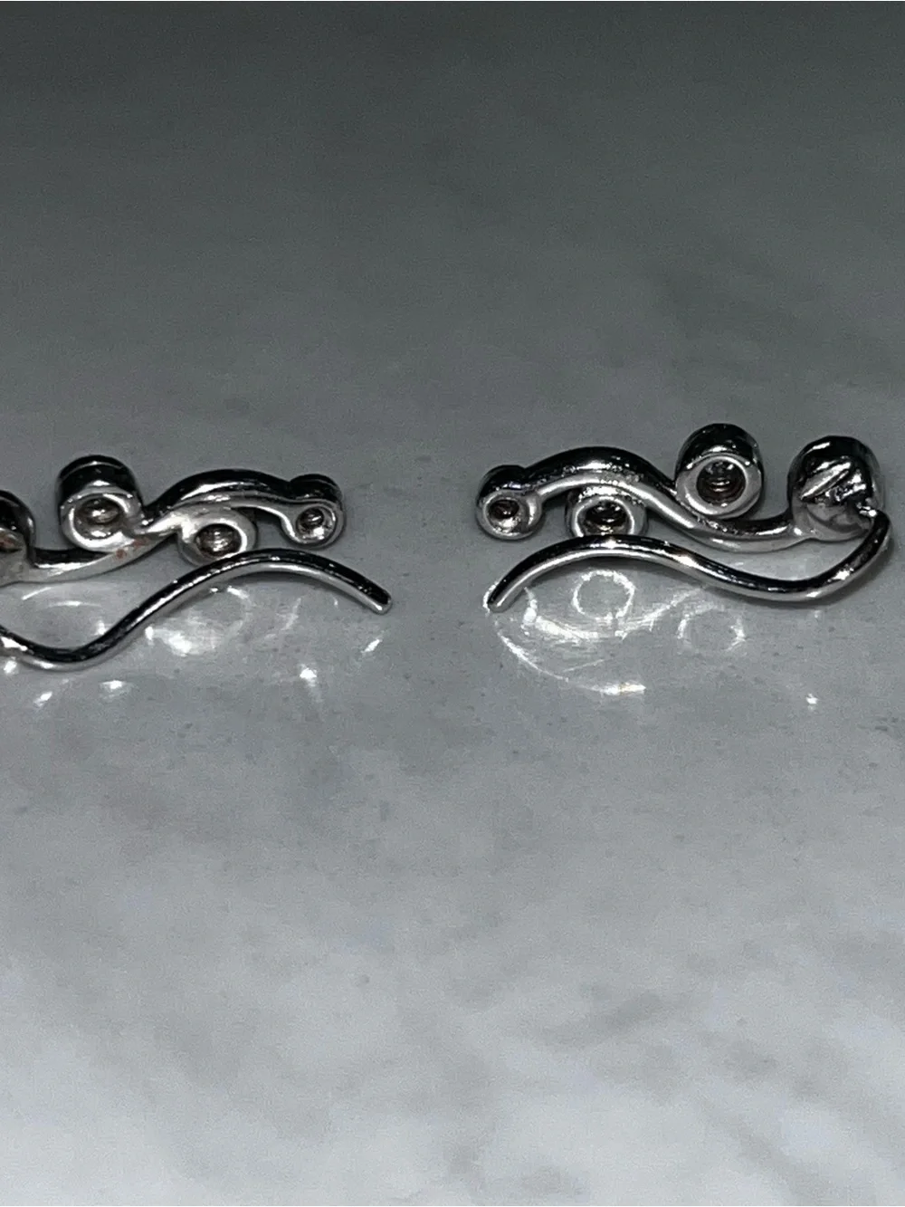 Diamond 10 Karat White Gold Wave Star Ear Climbers